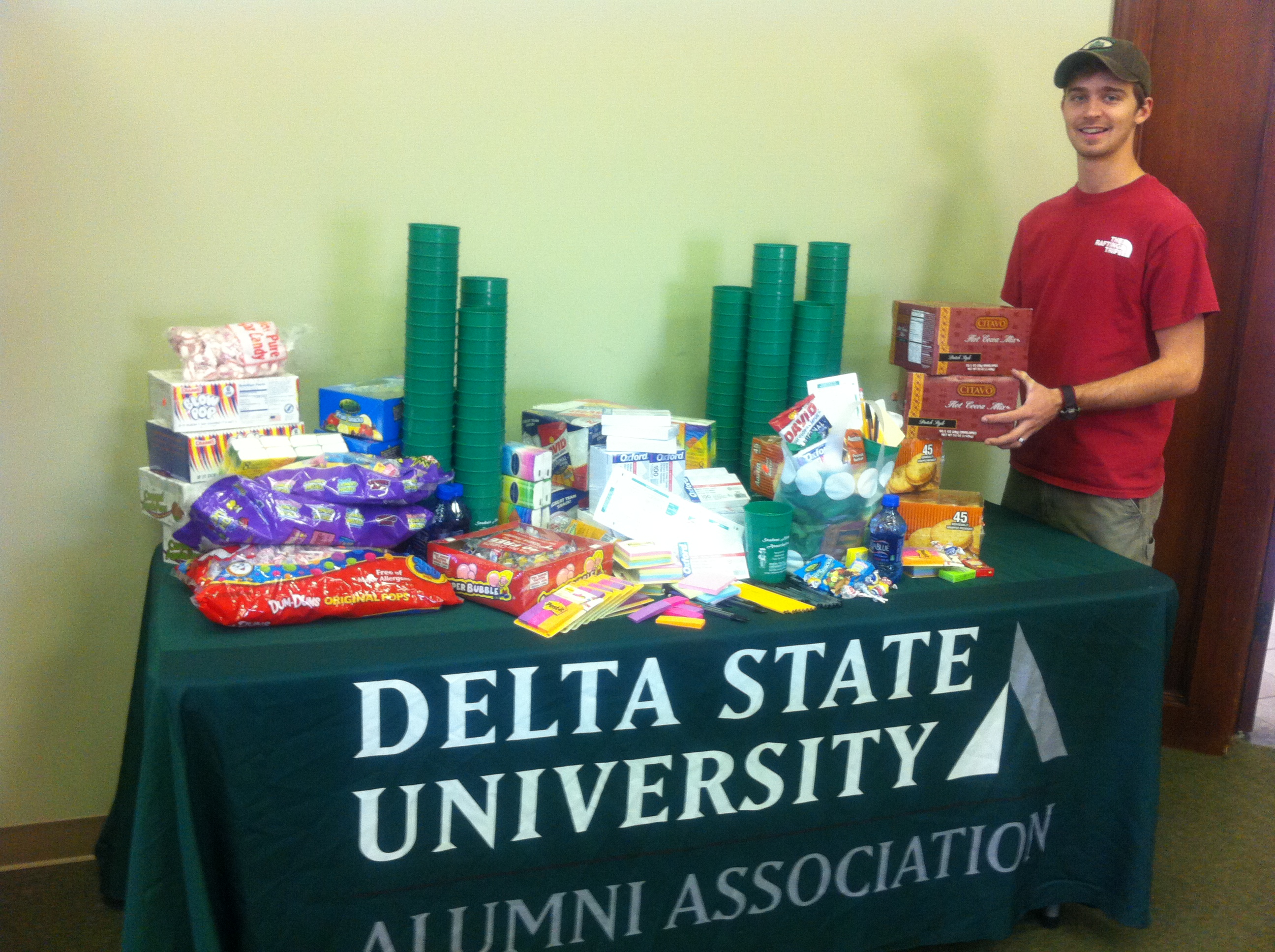 Photo:  SAA Director of Membership and Public Relations Alex Crosby puts together Student Survival Kits.